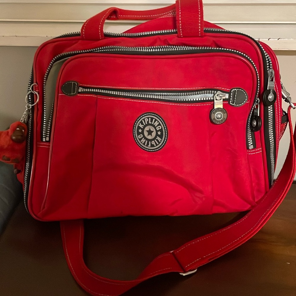 Like new, Vintage Kipling carry-on bag.  Red.